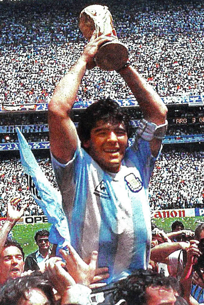 Diego Maradona lifting the World Cup for Argentina in 1986
